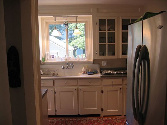 Sunny kitchen with stainless appliances