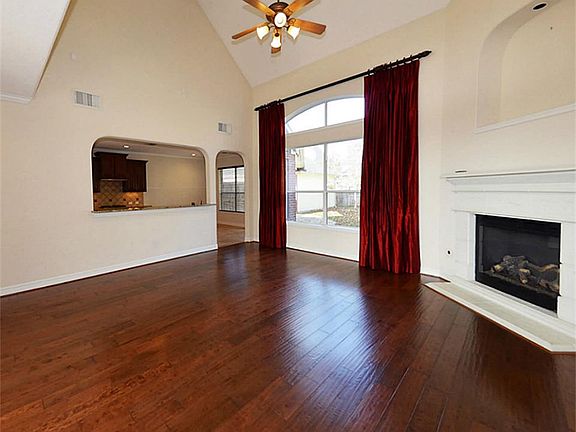 Note the extensive hand-scraped hardwood floors - den, dining room and study.