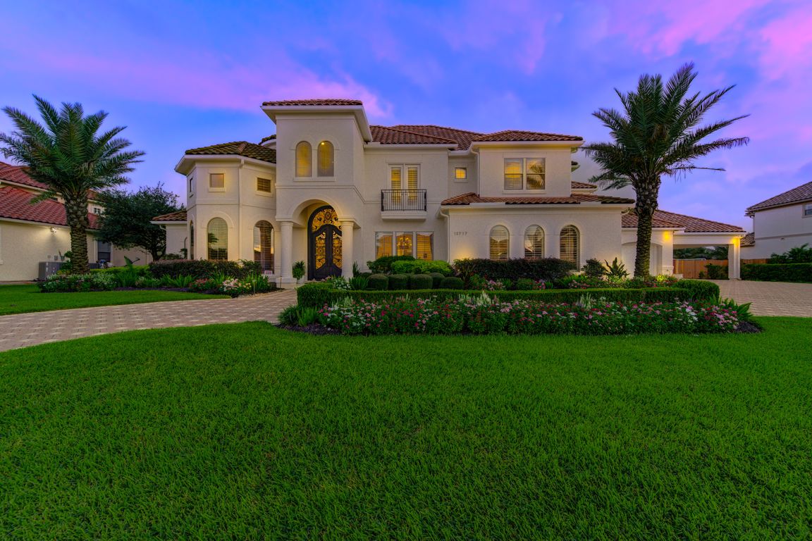 A stunning Kickerillo Signature estate greets you with commanding curb appeal on a rare 19,020 SF ravine lot. A sweeping circular driveway, manicured landscaping, and stately brick and stucco exterior set the tone for refined elegance and privacy with no rear neighbors.