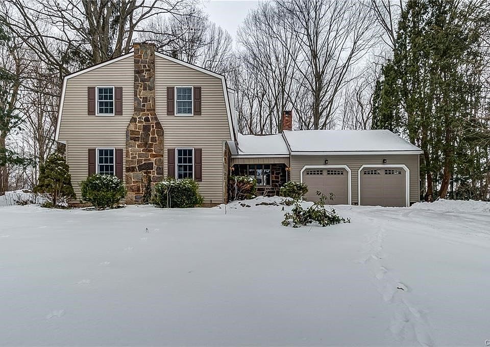 Welcome to this Unique Dutch Colonial with a Gambrel Roof!