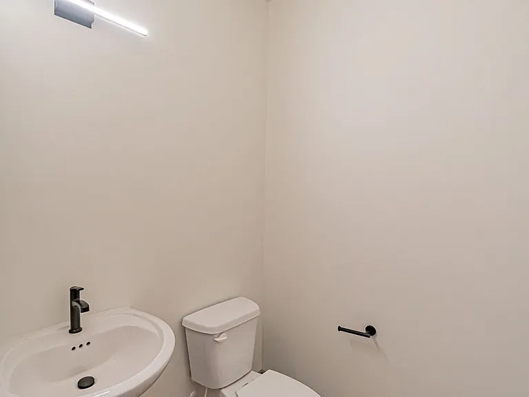 Main Level half bath ( Mirror is not pictured but has been installed)