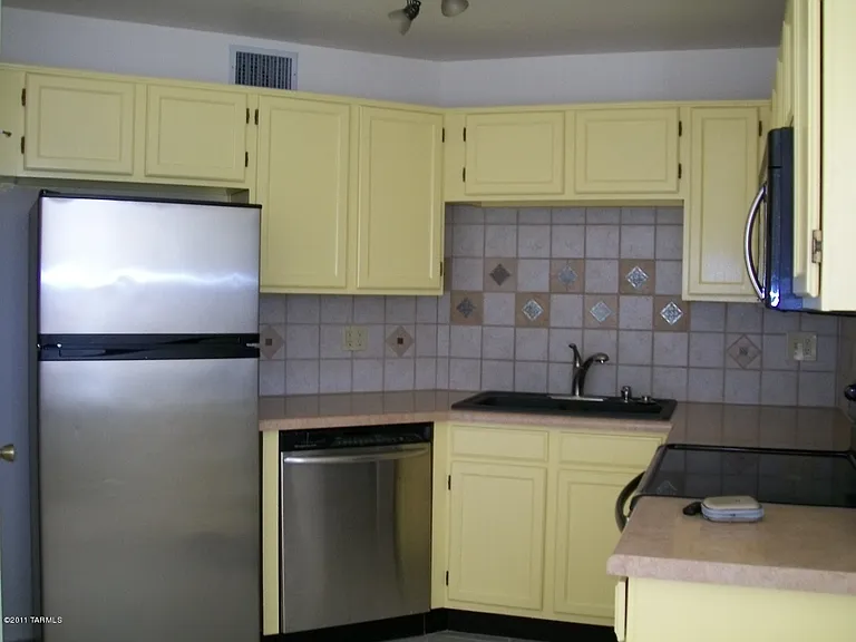 6655 N Canyon Crest Dr #8243 — Photo 1
