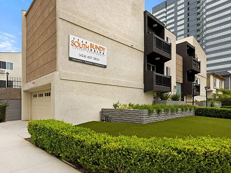 Front lawn and entrance of 1249 South Bundy with visible garage.
