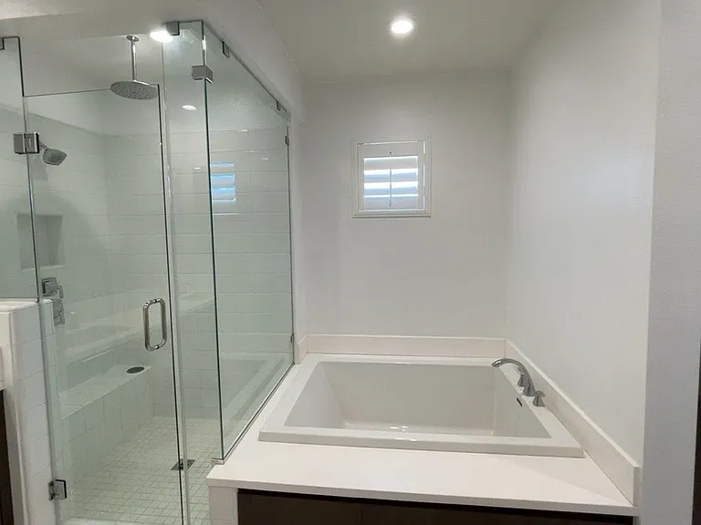 3rd floor - Primary bedroom with bathroom, large walk in closet with built in storage cabinets