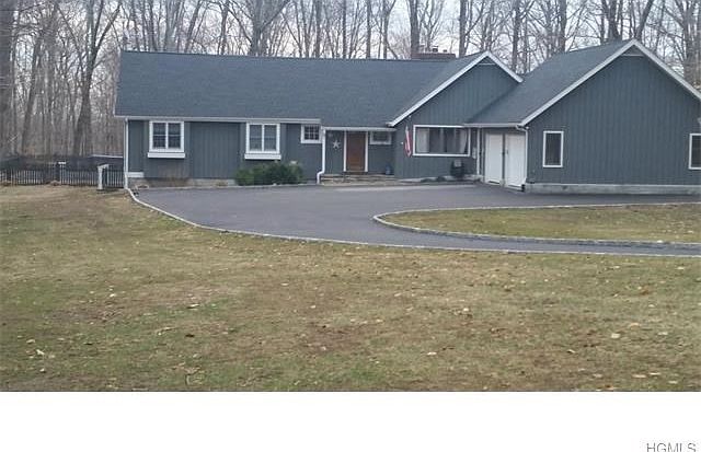 Front View- new driveway in 2013 with Belgium block on both sides.