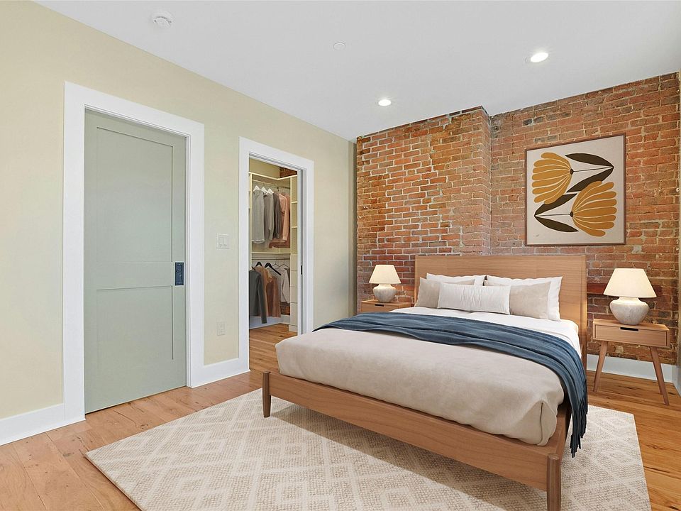Virtually Staged bedroom and walk-in closet.