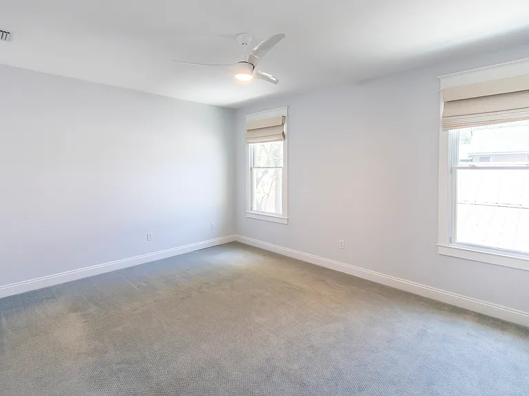 Primary suite has two windows letting in plenty of natural light.