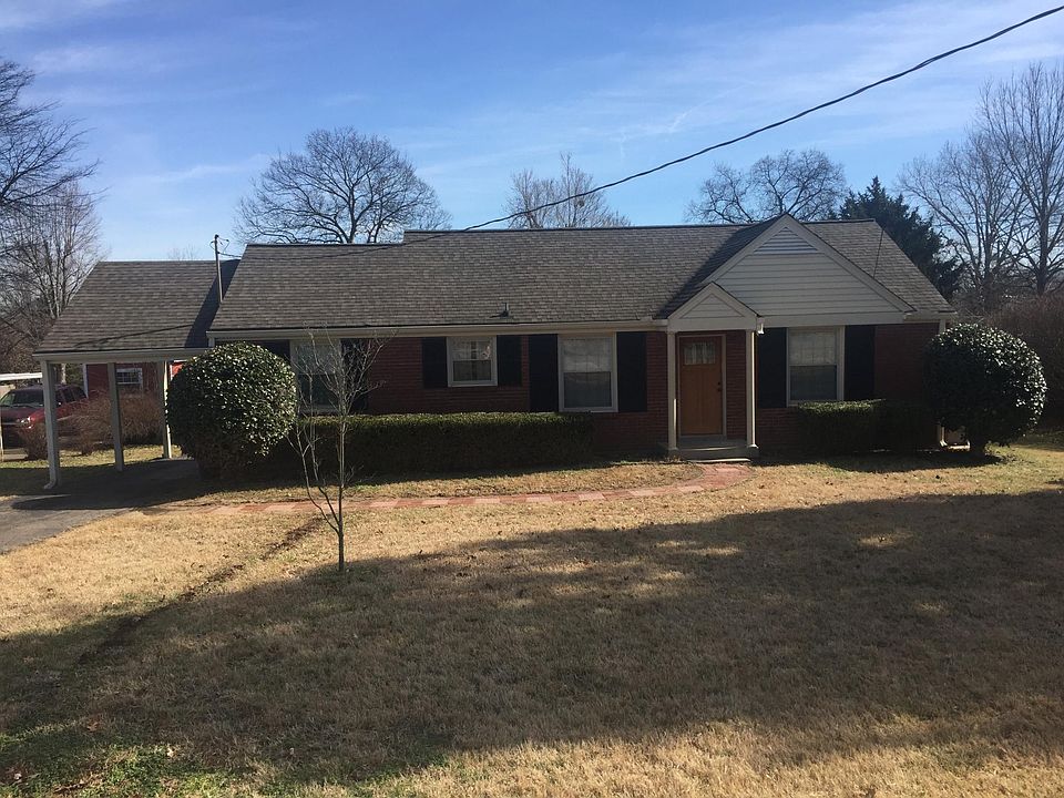 Front of Home. Carport on left side !!