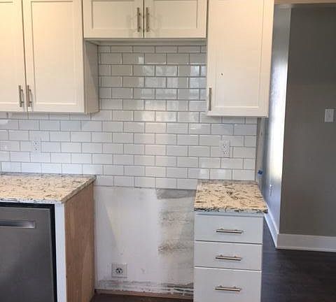 Kitchen with SS Appliances Stove, Refrigerator, OTR Micro an