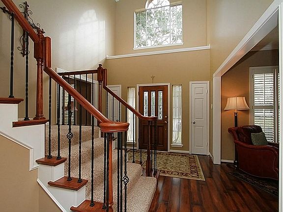 Current owners updated home with wrought iron balusters, updated Paint and light fixtures!