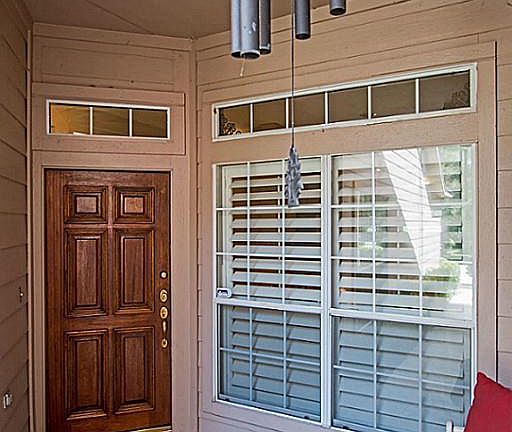 How cute, a charming front porch with room for a chair or two!