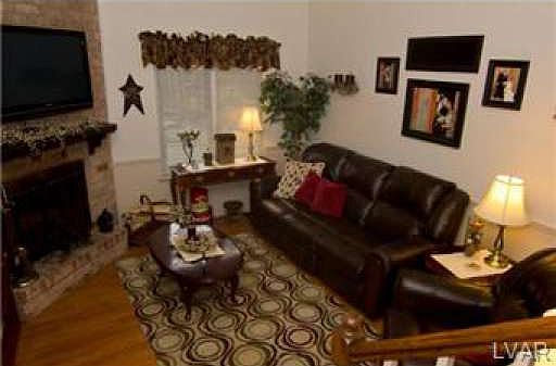 wood burning fireplace w/42" flat screen TV