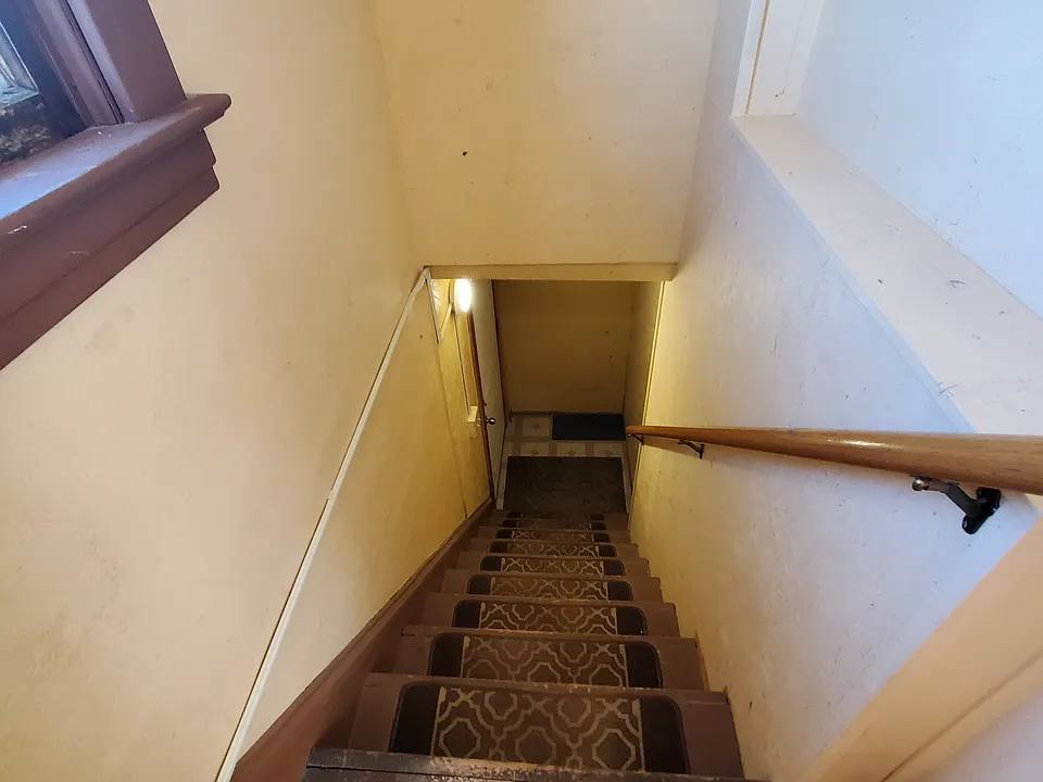 Inside stairs to unit