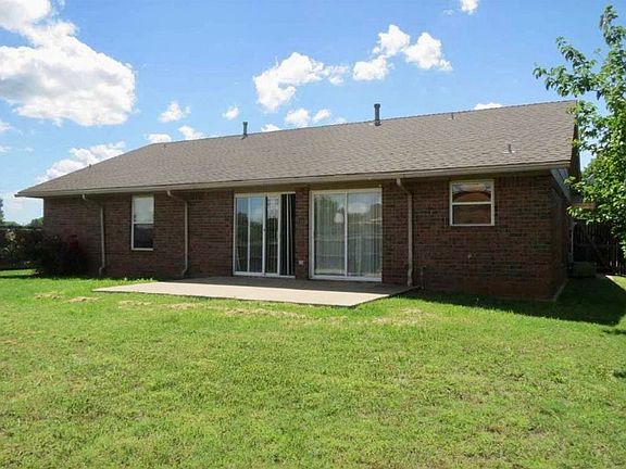 Large fenced backyard.