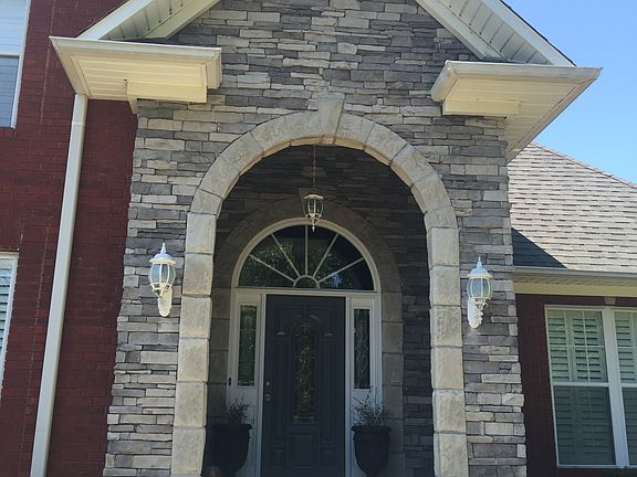 Impressive stone front porch