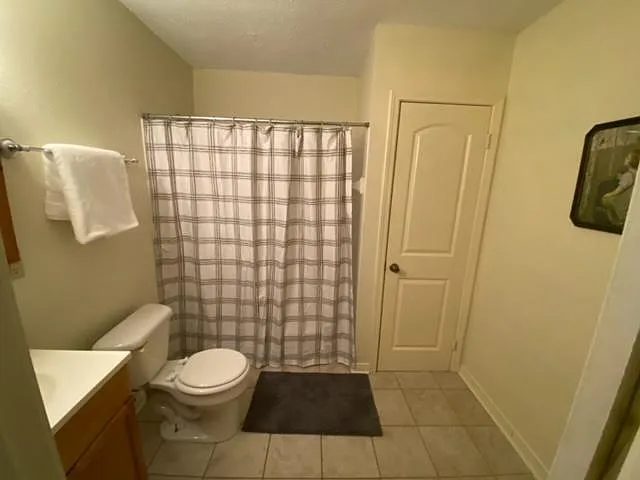 Full Bathroom #2 upstairs on second floor with the three bedrooms.