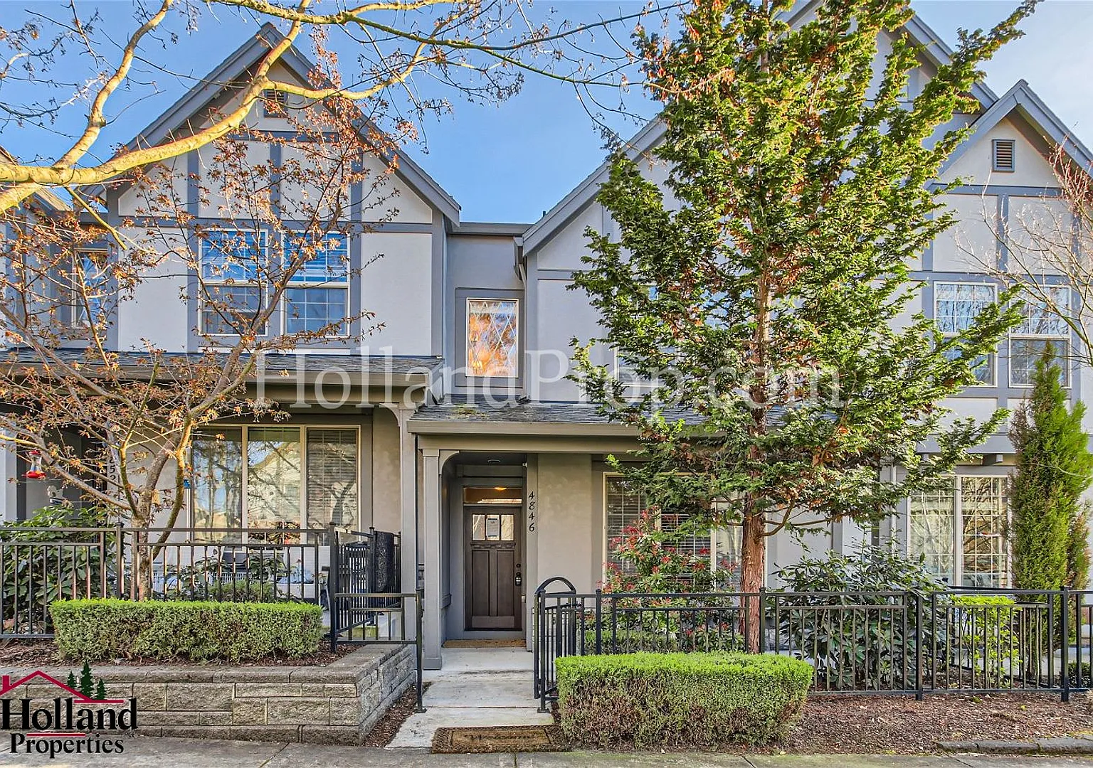 Elevated Two-Level Living with Modern Comfort & Style — Photo 1