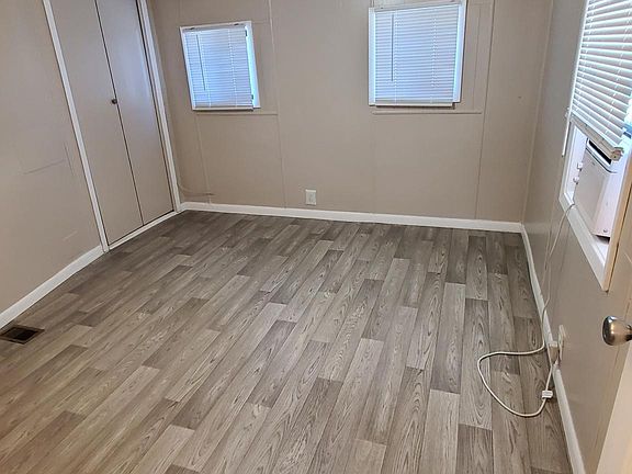 Front bedroom has small, attached bathroom.
