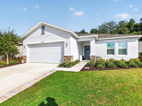 33692 SKY BLOSSOM CIRCLE, LEESBURG, FL 34788