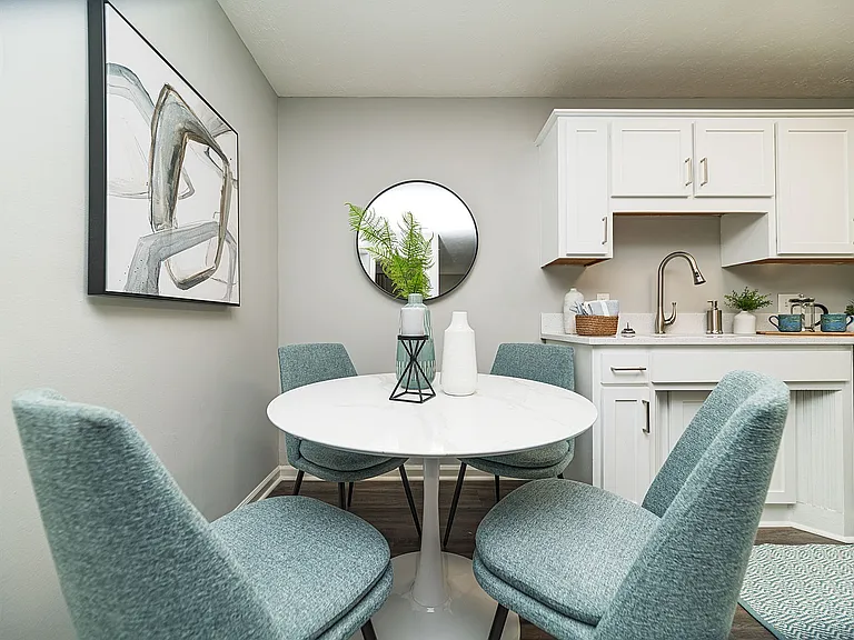 Dining area with hardwood-style flooring