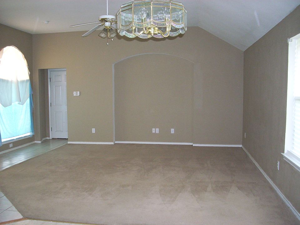 Den before re-tile/recarpet