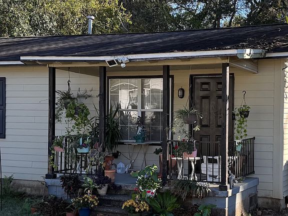 Front porch with railings.