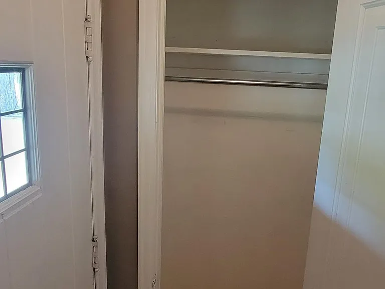 Front door on left, closet in vestibule.