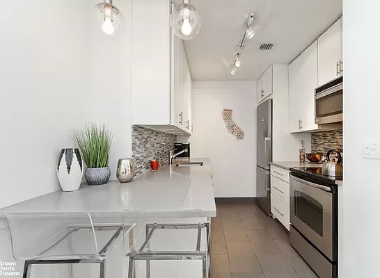 5th image of 23 E 10th St APT 4D