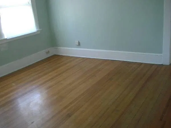 bedroom with one regular closet & one walk-in