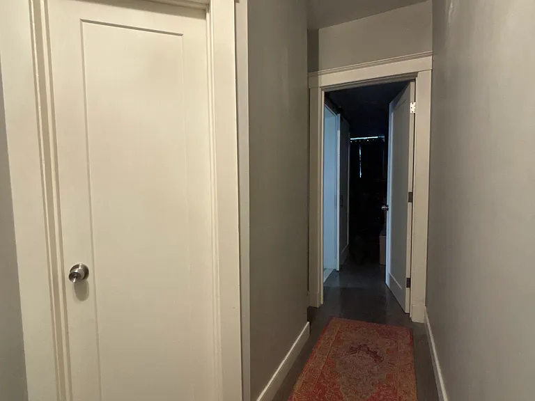 Hallway towards master. Closed door is Hall bathroom