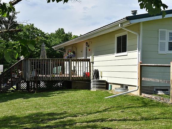 Back deck with fenced in yard.