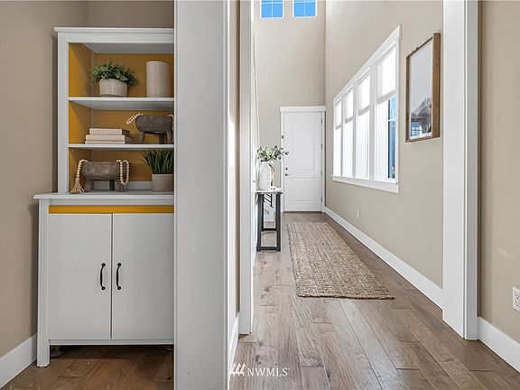 The efficient niche between the garage and the hallway creates a perfect space for a mudroom