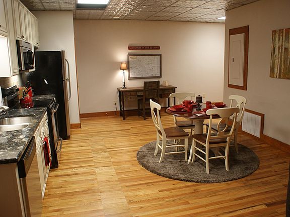 Spacious open kitchen, dining and workspace area