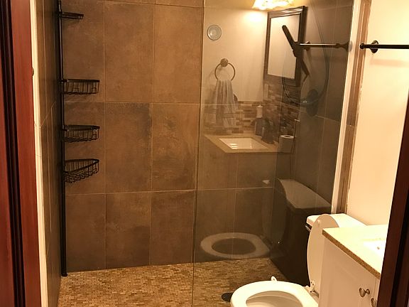 Walk-in ceramic tile shower