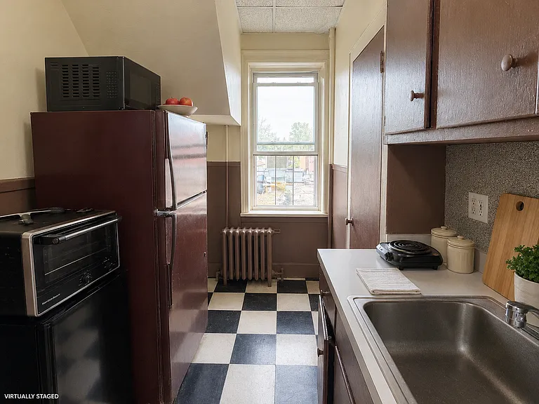 kitchen and bathroom separate from the living room and bedroom.