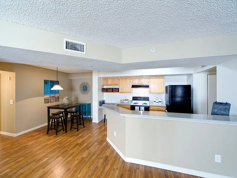 Open kitchen and dining area with lovely upgrades at Gregory Cove in Jacksonville, FL