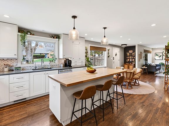 Step into this bright and spacious kitchen.