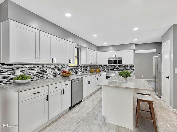 4th image of 9876 Tall Timber Dr
