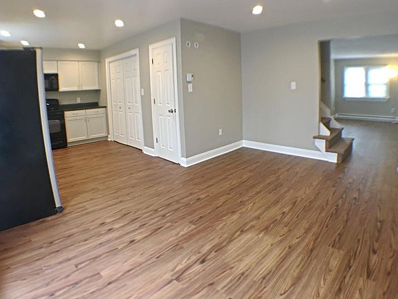 Dining room, kitchen, and living room area