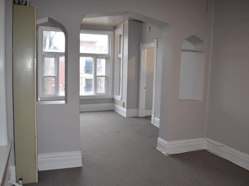 front Bay Windows into Living & Dining Rooms