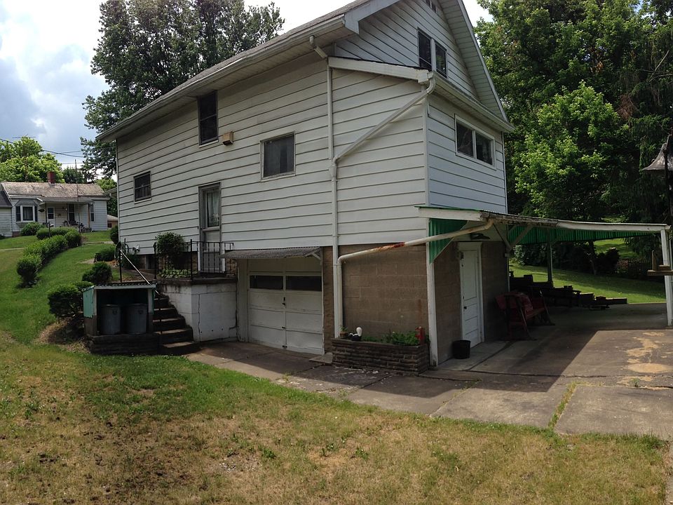 garage, and patio area, or could be used for carport