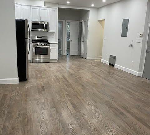 Open floor plan, kitchen and dining room