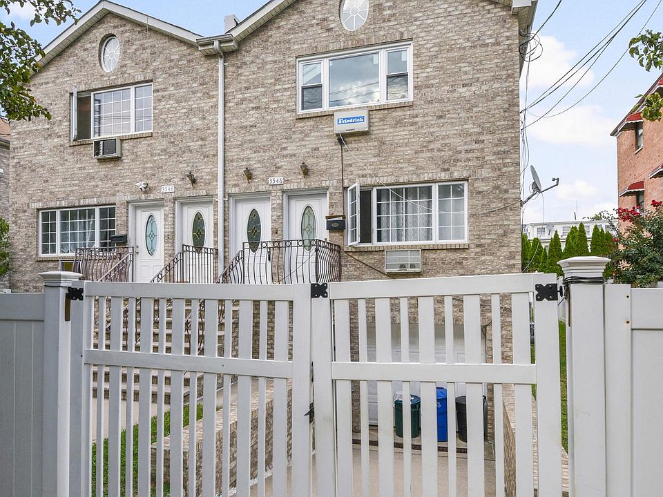 Serene Eastchester brick duplex - upper levels, right side. Ample street parking in quiet, tree-lined neighborhood.