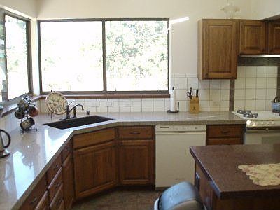 kitchen island + window + new granite