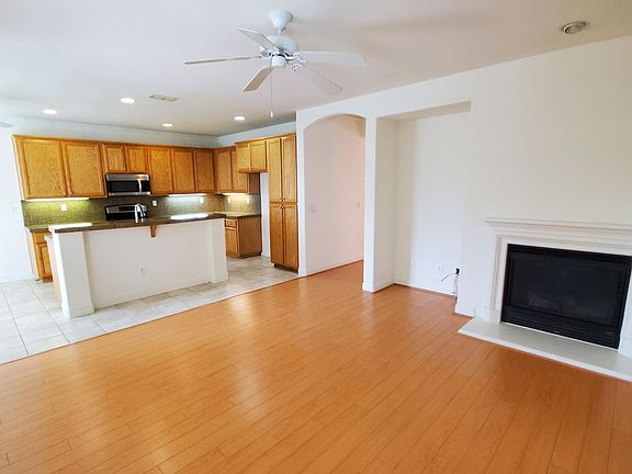 Family room with fireplace/kitchen combo.