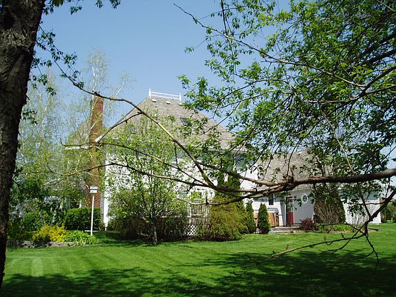 Back - 2 level deck with patio and spa