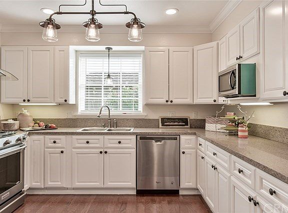 An all new kitchen with granite & stainless.