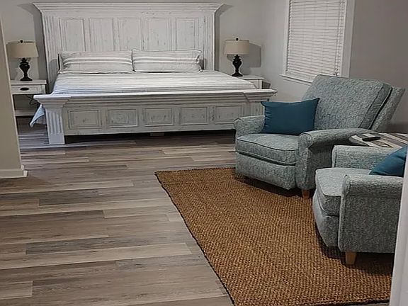 Master King EnSuite. Lovely seating area and work space.