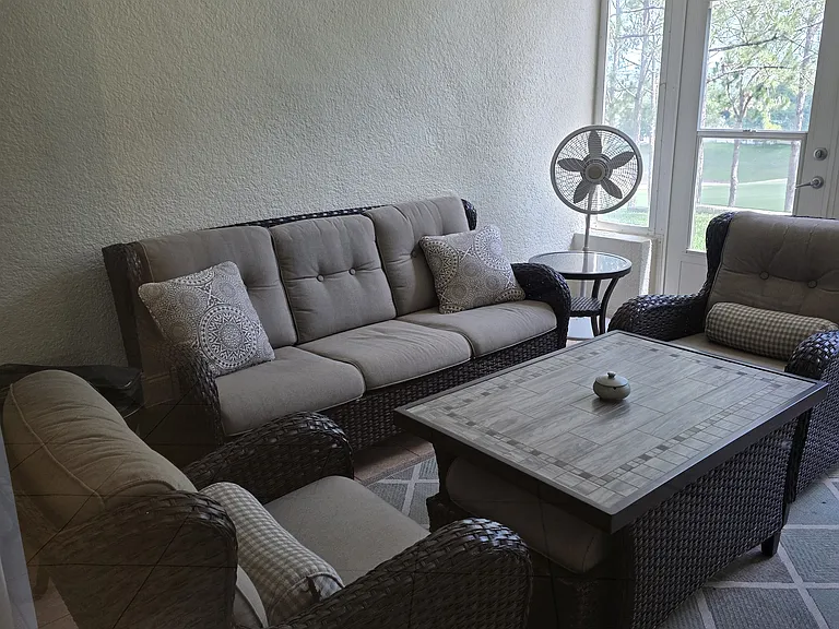 Enclosed 3 Season Lanai overlooks the Golf Course