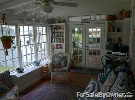 Sunroom
						:
						Looks onto backyard and back porch